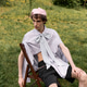 Stylish young man embraces retro chic fashion in vibrant outdoor setting Stylish young man embraces retro chic fashion in vibrant outdoor setting - PhotoDune Item for Sale
