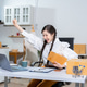 Happy businesswoman smiling at sales success after checking profits from home online store, concept Happy businesswoman smiling at sales success after checking profits from home online store, concept - PhotoDune Item for Sale