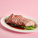 Tender char siu pork glazed with a sticky sweet sauce and slightly charred Tender char siu pork glazed with a sticky sweet sauce and slightly charred - PhotoDune Item for Sale