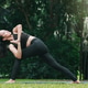 Asian woman practicing yoga in Prep Poses for Side Crane Pose for Parsva Bakasana on the mat. Asian woman practicing yoga in Prep Poses for Side Crane Pose for Parsva Bakasana on the mat. - PhotoDune Item for Sale