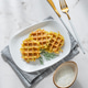 Vegetarian potato waffles with natural yogurt and dill on a plate on a marble background with mornin Vegetarian potato waffles with natural yogurt and dill on a plate on a marble background with mornin - PhotoDune Item for Sale