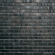 Texture of a perfectly laid dark charcoal-black brick wall Texture of a perfectly laid dark charcoal-black brick wall - PhotoDune Item for Sale