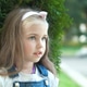 Portrait of pretty child girl standing outdoors Portrait of pretty child girl standing outdoors - PhotoDune Item for Sale