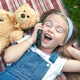 Little happy child girl laying on green lawn with her teddy bear Little happy child girl laying on green lawn with her teddy bear - PhotoDune Item for Sale