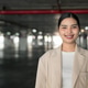 Young Thai Isan Woman Looking at Camera in Covered Parking Garage with Copy Space Young Thai Isan Woman Looking at Camera in Covered Parking Garage with Copy Space - PhotoDune Item for Sale