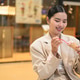 Young Thai Isan Woman Eating Ice Cream with Spoon and Copy Space in Shopping Mall Young Thai Isan Woman Eating Ice Cream with Spoon and Copy Space in Shopping Mall - PhotoDune Item for Sale
