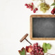 Wine Tasting Chalkboard with Grapes and Bottles Flat Lay Wine Tasting Chalkboard with Grapes and Bottles Flat Lay - PhotoDune Item for Sale