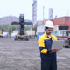 Industrial freight operator managing cargo transport operations with laptop at shipping container ya Industrial freight operator managing cargo transport operations with laptop at shipping container ya - PhotoDune Item for Sale