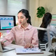 Asian businesswoman analyzing data charts on laptop and monitor in modern office workspace with coll Asian businesswoman analyzing data charts on laptop and monitor in modern office workspace with coll - PhotoDune Item for Sale
