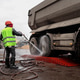 Truck Wheel Wash at the Construction Site of an Apartment Building or Shopping Mall Truck Wheel Wash at the Construction Site of an Apartment Building or Shopping Mall - PhotoDune Item for Sale