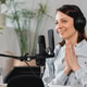 podcaster creates content, European woman records podcast with microphone and headphones, Caucasian podcaster creates content, European woman records podcast with microphone and headphones, Caucasian - PhotoDune Item for Sale