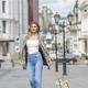 Portrait of a beautiful young blonde in the city center. The poses for photographs. Portrait of a beautiful young blonde in the city center. The poses for photographs. - PhotoDune Item for Sale