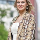 Portrait of a beautiful young blonde in the city center. The poses for photographs. Portrait of a beautiful young blonde in the city center. The poses for photographs. - PhotoDune Item for Sale