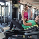 Two friends are working out together in the gym, sharing motivation and energy. Two friends are working out together in the gym, sharing motivation and energy. - PhotoDune Item for Sale