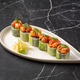 Sushi rolls wrapped in cucumber with spicy topping Sushi rolls wrapped in cucumber with spicy topping - PhotoDune Item for Sale