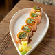 Sushi rolls wrapped in salmon with spicy sauce Sushi rolls wrapped in salmon with spicy sauce - PhotoDune Item for Sale