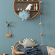 Child room interior with blue wall, round shelf on wall, wooden armchair, plaid, colorful garland, s Child room interior with blue wall, round shelf on wall, wooden armchair, plaid, colorful garland, s - PhotoDune Item for Sale