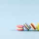 Traditional French almond cookies with sweet filling. Assorted colorful macarons Traditional French almond cookies with sweet filling. Assorted colorful macarons - PhotoDune Item for Sale