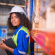 Warehouse workers wearing safety discussing inspection inventory detail storage facility shelves pac Warehouse workers wearing safety discussing inspection inventory detail storage facility shelves pac - PhotoDune Item for Sale
