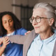 Nurse giving hand massage to senior woman at home, rehabilitation therapy Nurse giving hand massage to senior woman at home, rehabilitation therapy - PhotoDune Item for Sale