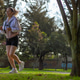 Woman jogging in park practicing outdoor workout Woman jogging in park practicing outdoor workout - PhotoDune Item for Sale