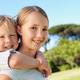 Portrait, children and piggyback in park with siblings for travel, pretend game Portrait, children and piggyback in park with siblings for travel, pretend game - PhotoDune Item for Sale