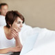 Woman, thinking and laptop in bedroom with couple, relax or ideas for tv show Woman, thinking and laptop in bedroom with couple, relax or ideas for tv show - PhotoDune Item for Sale
