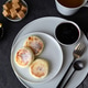 Three cottage cheese pancakes with jam lie on a gray plate Three cottage cheese pancakes with jam lie on a gray plate - PhotoDune Item for Sale