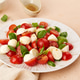 Italian caprese salad with sliced tomatoes, mozzarella, basil and olive oil Italian caprese salad with sliced tomatoes, mozzarella, basil and olive oil - PhotoDune Item for Sale