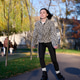 Young woman roller skating through park path, focused on ride in autumn daylight Young woman roller skating through park path, focused on ride in autumn daylight - PhotoDune Item for Sale