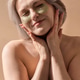 Young woman with silver hair applying green eye patches, smiling gently while enjoying a skincare ro Young woman with silver hair applying green eye patches, smiling gently while enjoying a skincare ro - PhotoDune Item for Sale