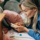 Woman at home using smartphone for health monitoring and online consultation with AI assistant Woman at home using smartphone for health monitoring and online consultation with AI assistant - PhotoDune Item for Sale