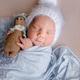 Newborn baby sleeps with crochet doll Newborn baby sleeps with crochet doll - PhotoDune Item for Sale