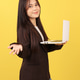 Young Asian Bussiness Woman Holding Laptop Young Asian Bussiness Woman Holding Laptop - PhotoDune Item for Sale
