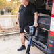 Man with prosthetic leg preparing for van life Man with prosthetic leg preparing for van life - PhotoDune Item for Sale