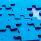 Colorful blue puzzle pieces scattered on a flat surface during a leisure activity in a well-lit room Colorful blue puzzle pieces scattered on a flat surface during a leisure activity in a well-lit room - PhotoDune Item for Sale