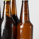 Bottles with condensation in a simple light setting on a neutral background Bottles with condensation in a simple light setting on a neutral background - PhotoDune Item for Sale