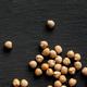 Seeds placed on a dark surface showing different shapes and textures for a close-up view Seeds placed on a dark surface showing different shapes and textures for a close-up view - PhotoDune Item for Sale