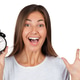 Woman holds alarm clock and shows excitement during celebration or surprise event Woman holds alarm clock and shows excitement during celebration or surprise event - PhotoDune Item for Sale