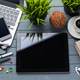 Workspace setup with laptop, tablet, phone, and coffee on a wooden table Workspace setup with laptop, tablet, phone, and coffee on a wooden table - PhotoDune Item for Sale