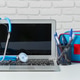 Health tools and workstation set up on a table with a laptop and supplies in a simple space Health tools and workstation set up on a table with a laptop and supplies in a simple space - PhotoDune Item for Sale