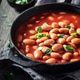 Spicy baked beans with herbs and tomato sauce. Spicy baked beans with herbs and tomato sauce. - PhotoDune Item for Sale