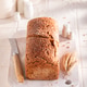 Fresh oat bread baked in a rustic bright kitchen. Fresh oat bread baked in a rustic bright kitchen. - PhotoDune Item for Sale