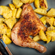 Appetizing baked chicken leg quarter. Appetizing baked chicken leg quarter. - PhotoDune Item for Sale