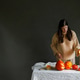 Making jack o lantern. Woman hands lighing up candles and carving pumpkins on table Making jack o lantern. Woman hands lighing up candles and carving pumpkins on table - PhotoDune Item for Sale
