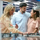 Retail assistant helping couple buying kitchen appliance Retail assistant helping couple buying kitchen appliance - PhotoDune Item for Sale