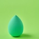 Green Makeup Sponge Standing Upright On Green Background Vertical Composition Close Up Textured Green Makeup Sponge Standing Upright On Green Background Vertical Composition Close Up Textured - PhotoDune Item for Sale