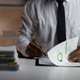Businessman analyzing financial charts and reports working late. Businessman working late, analyzing Businessman analyzing financial charts and reports working late. Businessman working late, analyzing - PhotoDune Item for Sale