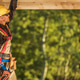 Worker in safety gear hanging from beam on construction site during daytime Worker in safety gear hanging from beam on construction site during daytime - PhotoDune Item for Sale