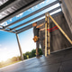 Worker climbs a ladder to perform tasks in a construction area Worker climbs a ladder to perform tasks in a construction area - PhotoDune Item for Sale